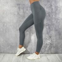 Chemical Fiber Nine Point Pants Women Yoga Pants lift the hip & flexible & with pocket Spandex plain dyed Solid PC