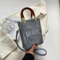 Denim Handbag soft surface & attached with hanging strap letter PC