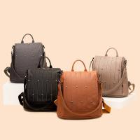 PU Leather Backpack anti-theft & large capacity & attached with hanging strap & studded PC