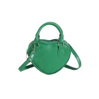 PU Leather Easy Matching Handbag soft surface & attached with hanging strap heart pattern PC