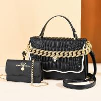 PU Leather Handbag soft surface & attached with hanging strap & two piece Solid Set