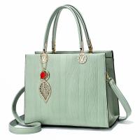 PU Leather Handbag with hanging ornament & large capacity & attached with hanging strap PC