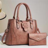 PU Leather Handbag large capacity & attached with hanging strap & two piece Polyester Solid Set