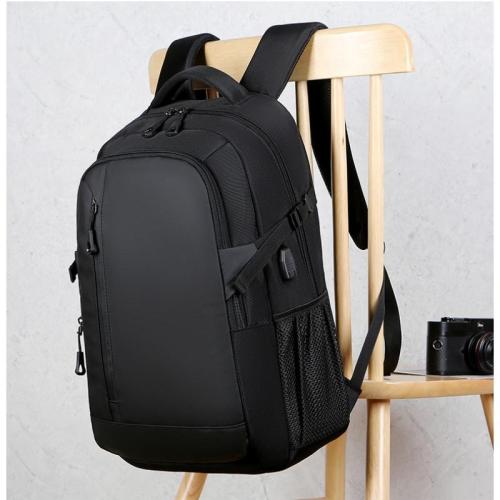 Nylon with hole for headphone Backpack large capacity & with USB interface & waterproof Polyester Solid black PC